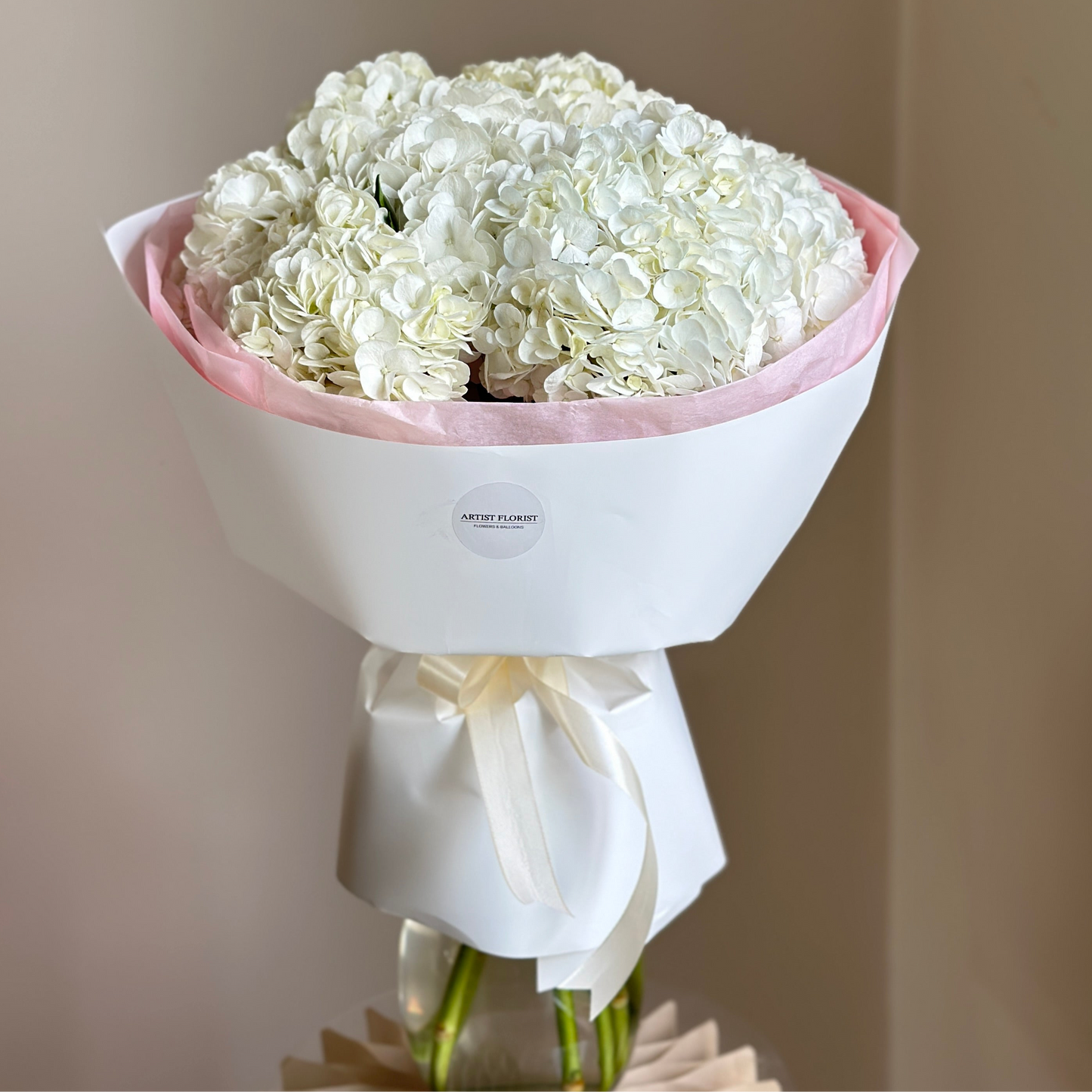 White Hydrangea Bouquet – 7 Stems in Signature Wrapping