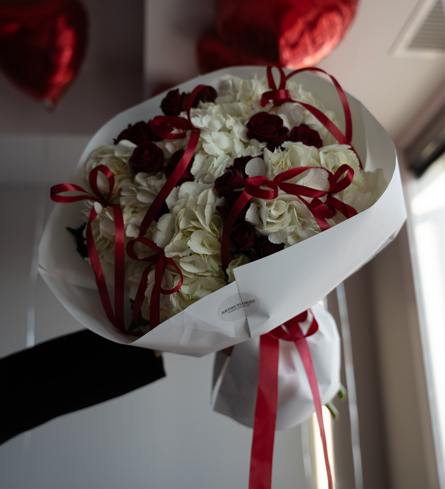 Crimson Elegance – Hydrangea & Spray Roses Bouquet with Red Bows