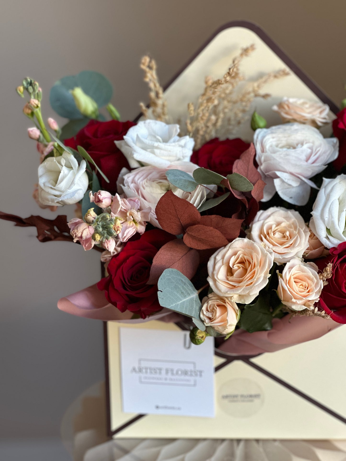 Crimson Elegance – White, Red & Beige Floral Envelope Arrangement