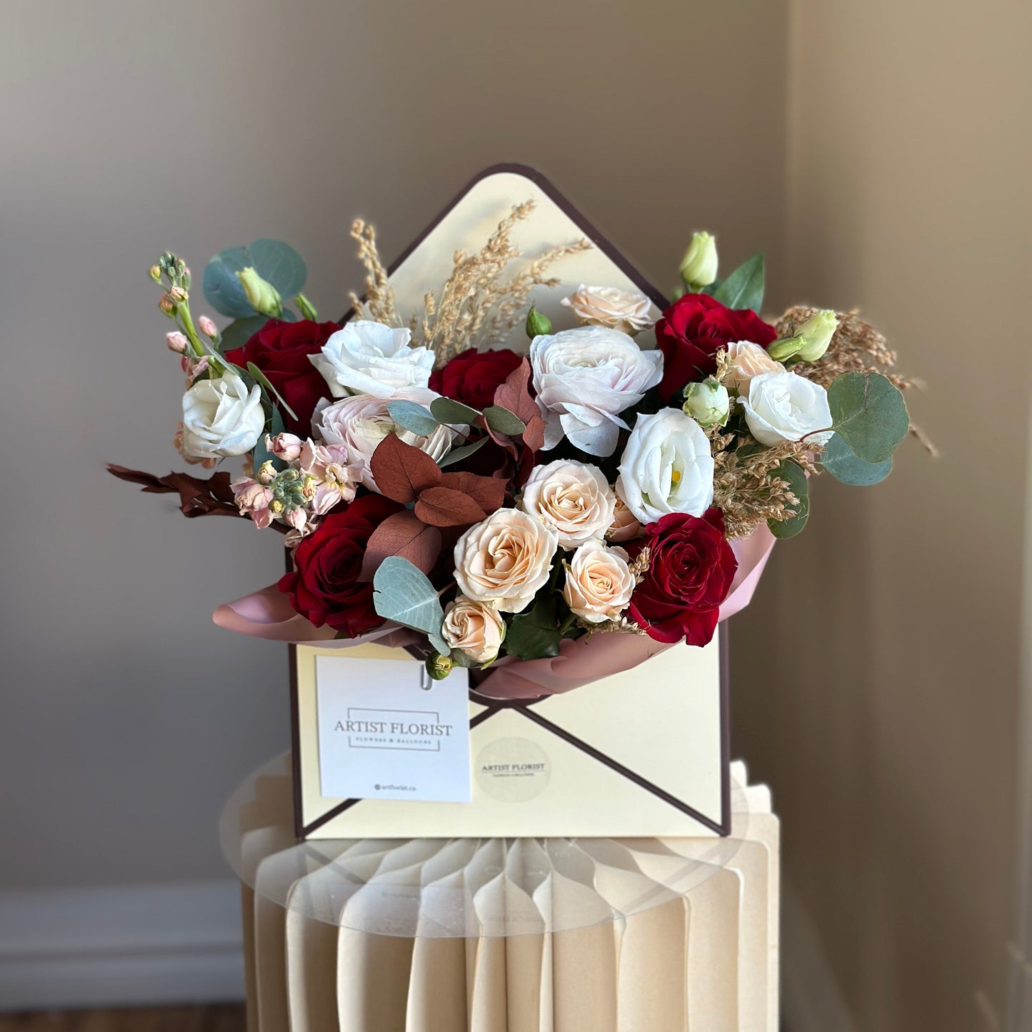 Crimson Elegance – White, Red & Beige Floral Envelope Arrangement