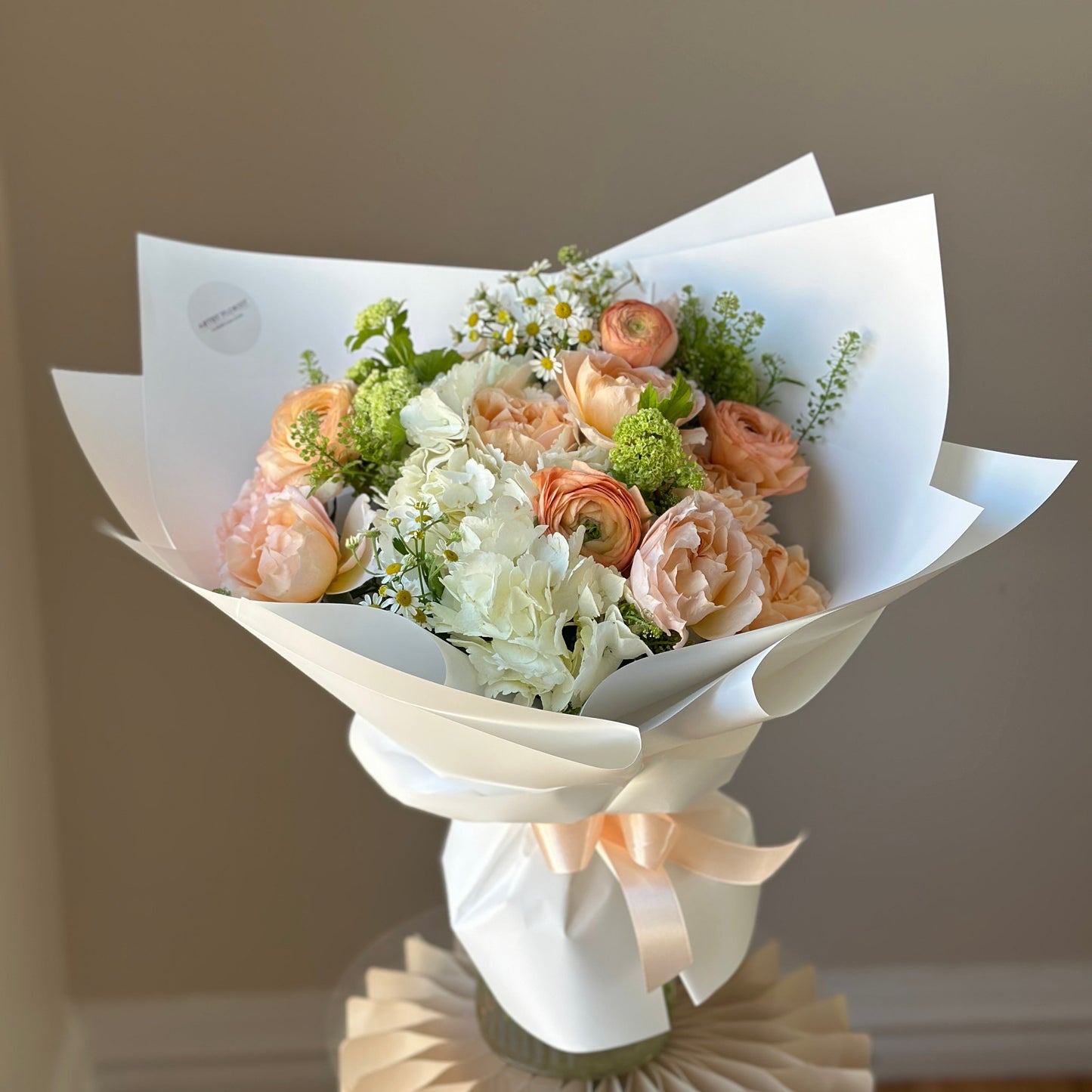 Peachy Marmalade Bouquet – Hydrangea, Ranunculus & Spray Roses