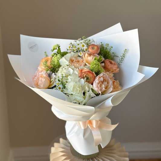 Peachy Marmalade Bouquet – Hydrangea, Ranunculus & Spray Roses